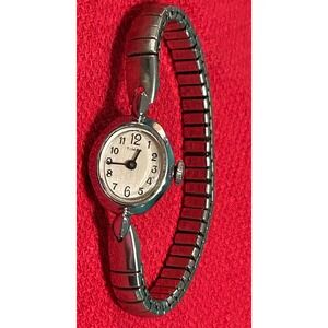 Vintage Timex Watch Women 17mm Silver Tone Oval Dial Stretch Band Manual Wind a3